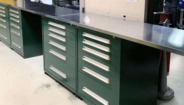Lyon automotive parts counter with modular drawers and stainless steel top