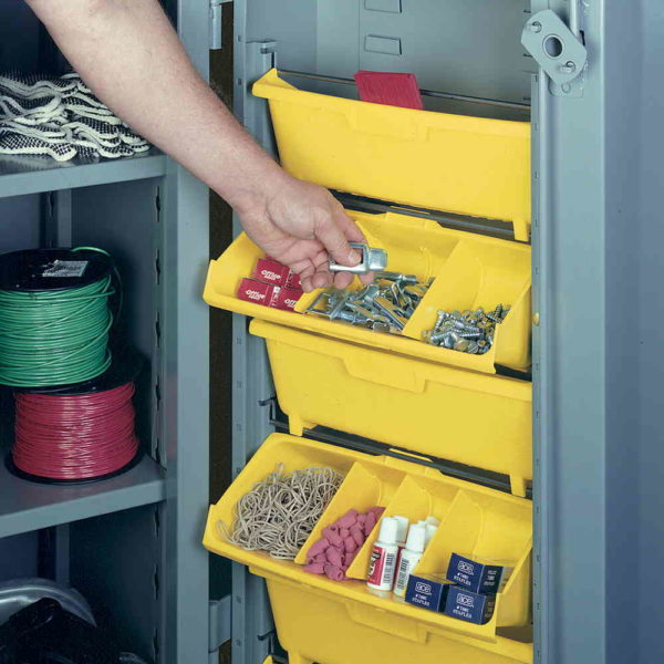 Removable tilt bins increase storage density, are corrosion resistant, and impervious to most solvents.